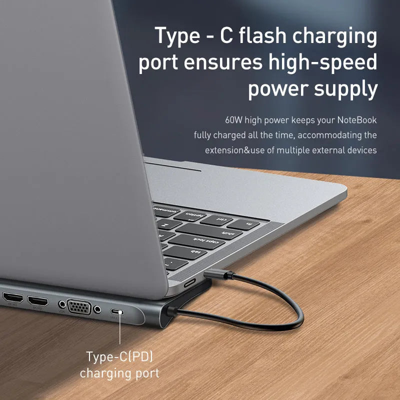 Grey aluminium alloy USB C hub docking station with cooling bracket showing ten ports including HDMI and VGA