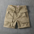 Men's straight-leg cargo shorts in khaki colour with multiple pockets.