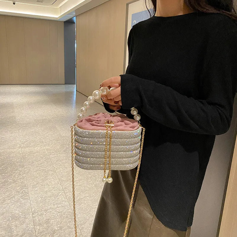 Women's retro style crossbody bag with pearl beading on soft PU material in round dinner bag shape