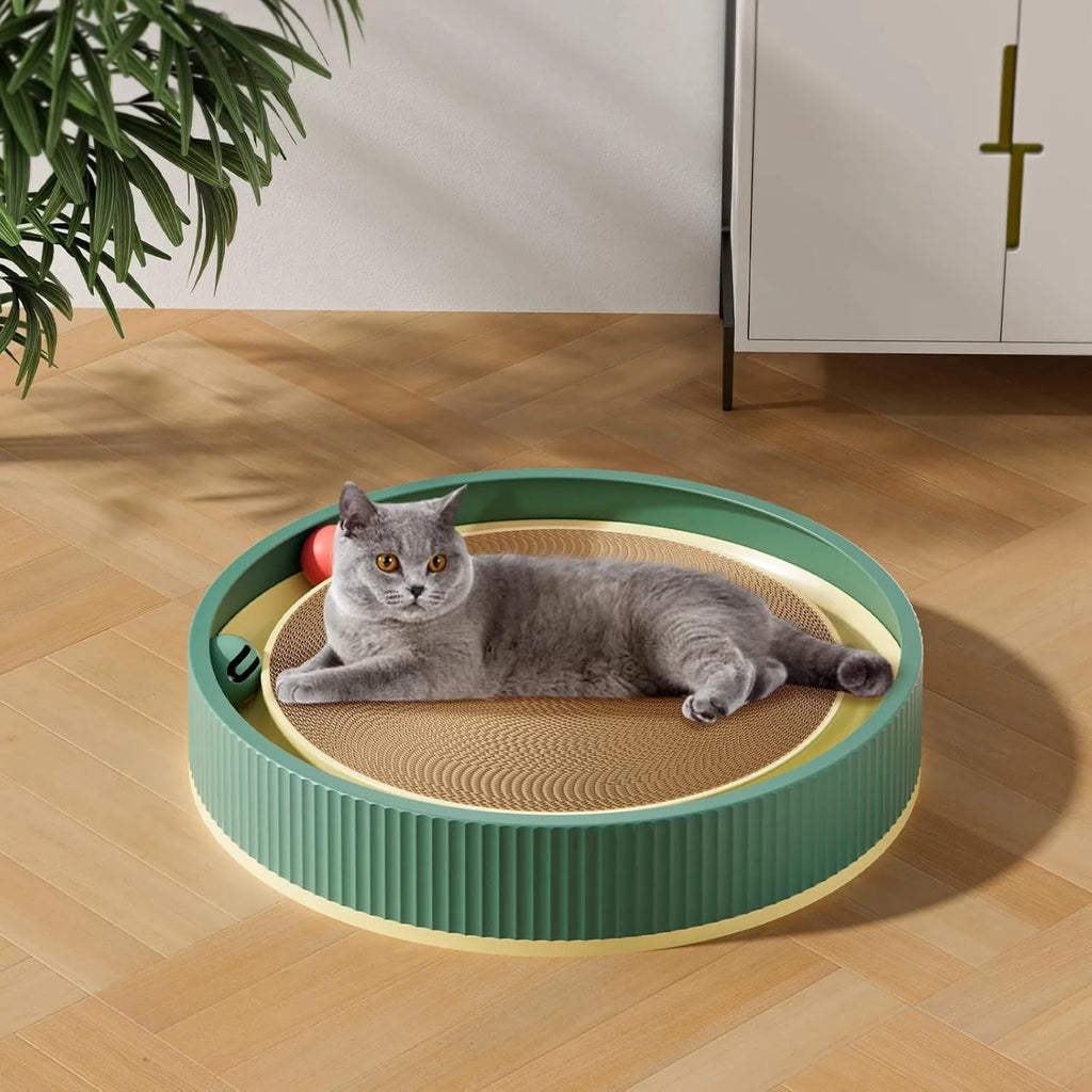 Large green cat scratching board with interactive ball toys showing refillable core design