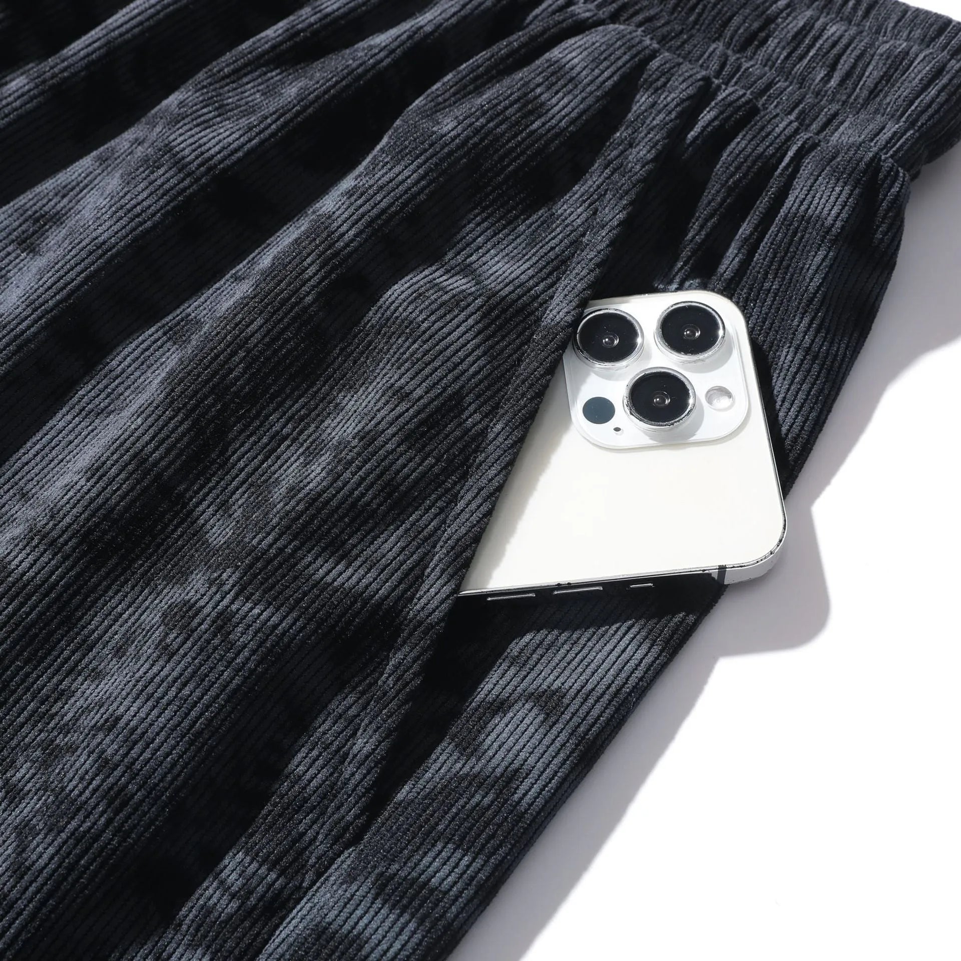 Men's corduroy camouflage pattern athletic shorts in a straight-leg style with a high waist.