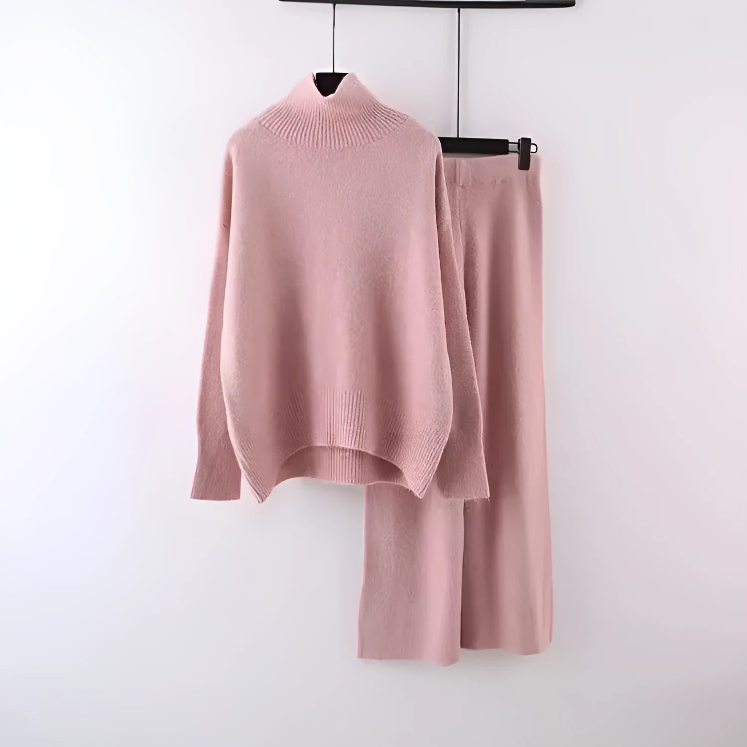 Women's milky white acrylic knit sweater and wide-leg trousers two-piece casual set.