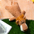 Plush dog toy with corn-kernel texture and animal shapes in green, grey or yellow