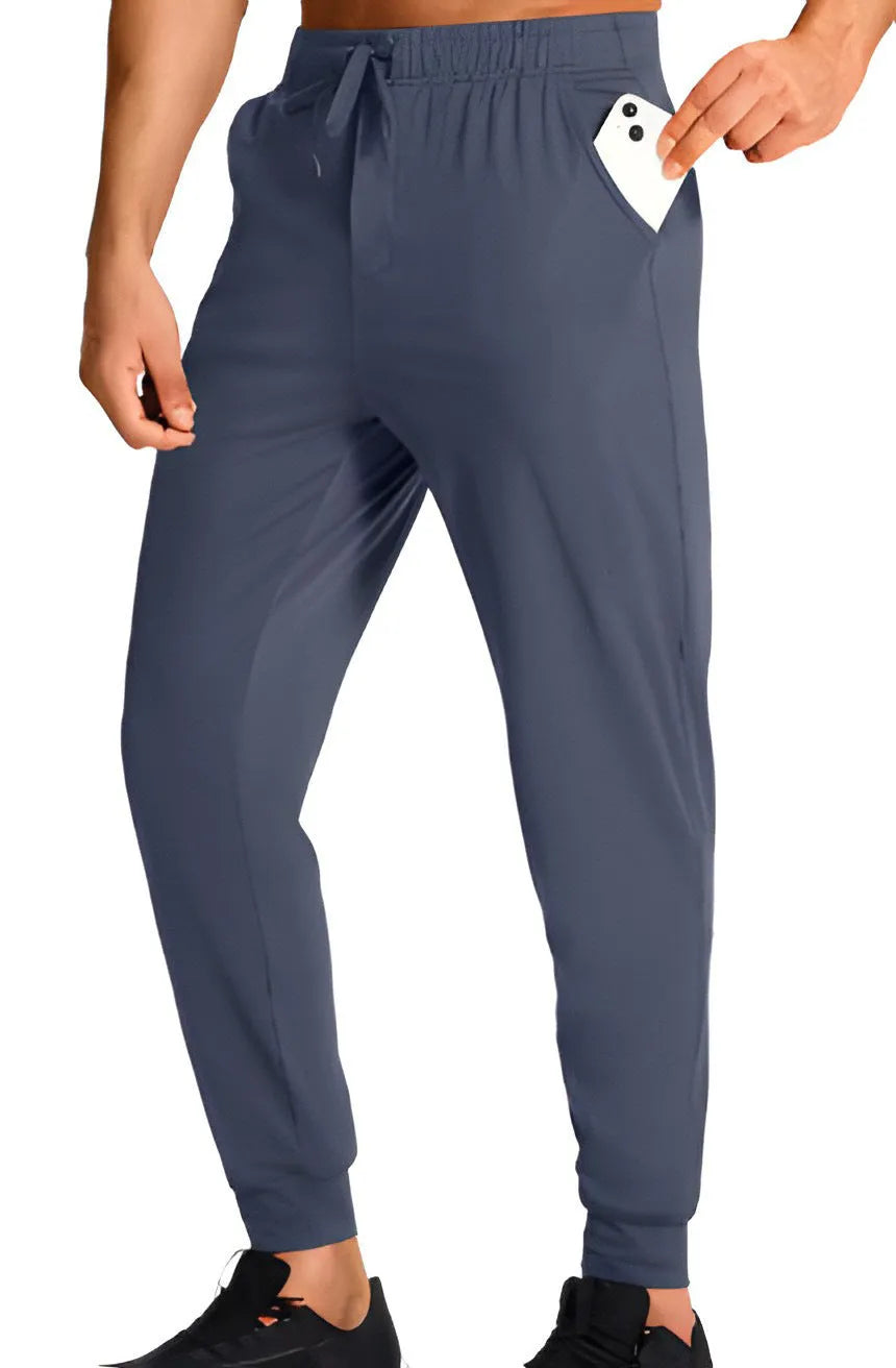 Men's loose fit polyester trousers in solid colour available in sizes XS to 4XL