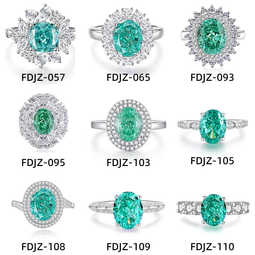 Women's sterling silver ring with a central emerald stone and diamond accent on a geometric band.
