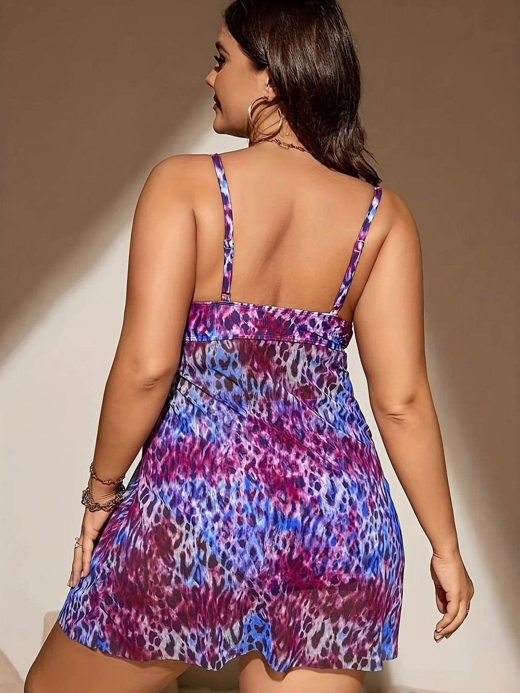 Plus size women's two-piece bikini set with split hem skirt in blue colour
