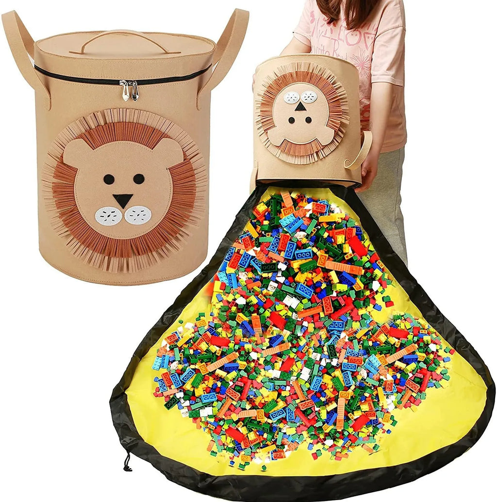 Green felt cube storage bag open as a play mat next to toys, showing pull rope closure