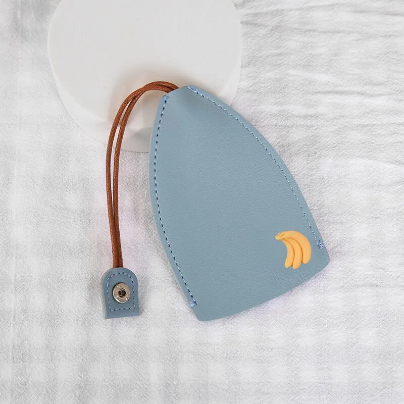 Cartoon pull-out car key case in PU leather with various design options including cactus, rabbit, and fruit themes