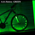 Mountain bike spoke light with black shell on bicycle wheel