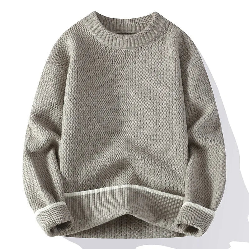 Men's loose fit round neck long sleeve pullover sweater in grey on a hanger