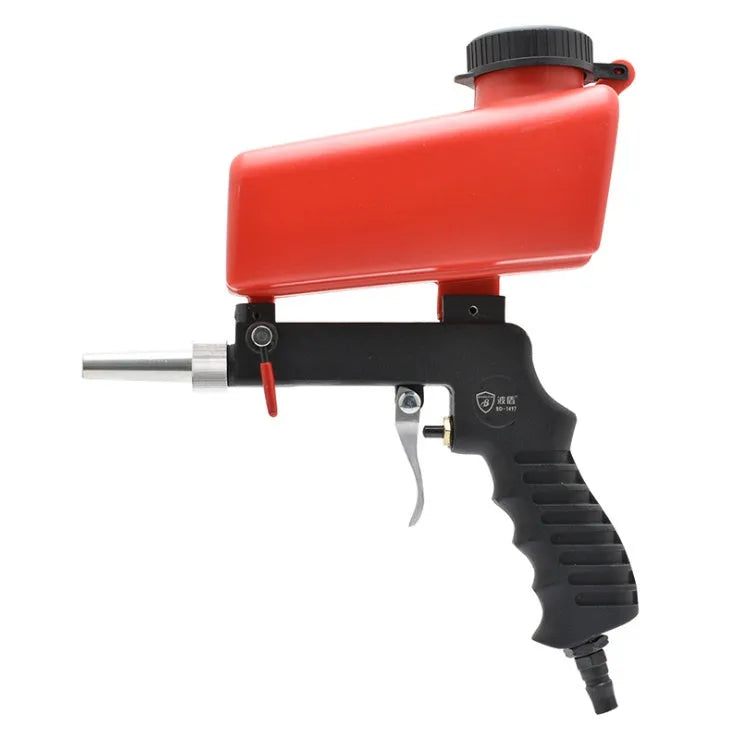 Portable black pneumatic sandblasting gun with gravity feed tank for rust removal and descaling work.