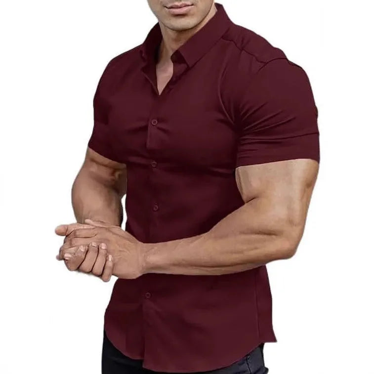 Man wearing a brown short sleeve casual printed shirt with a collar.
