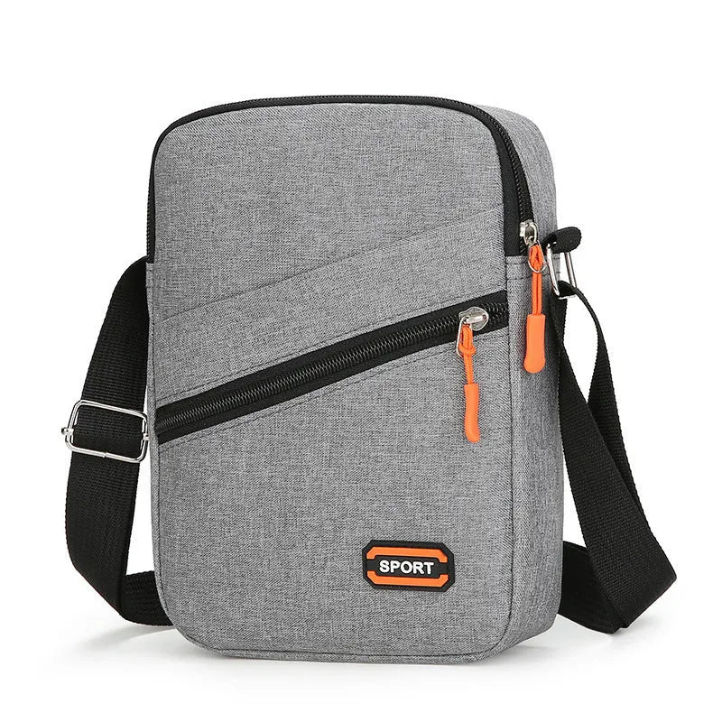 Ultra light Oxford cloth crossbody commuter bag in black, navy blue, or silver grey.