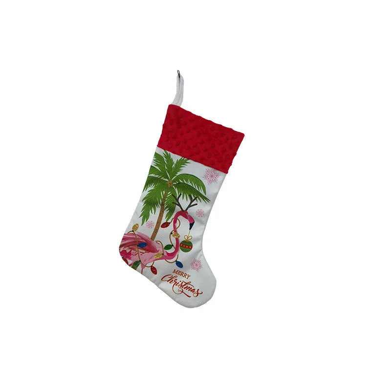 Flamingo design cloth Christmas stocking measuring 46 by 28 centimetres.