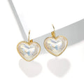 A pair of gold-coloured alloy clip-on earrings for women in a natural style.