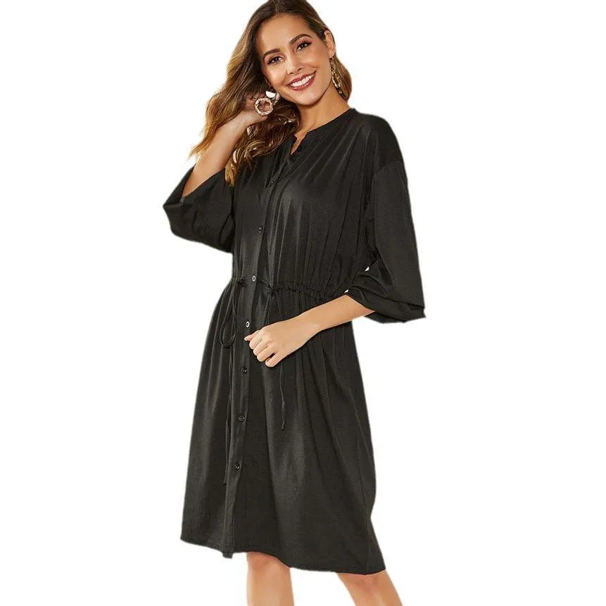 Women's mid-length dress with elastic waist belt and long sleeves in black or red