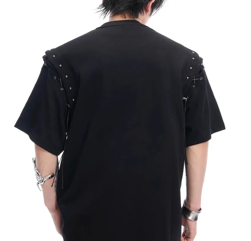 Black deconstructed lace-up short sleeve t-shirt with front cutout detail on a mannequin.