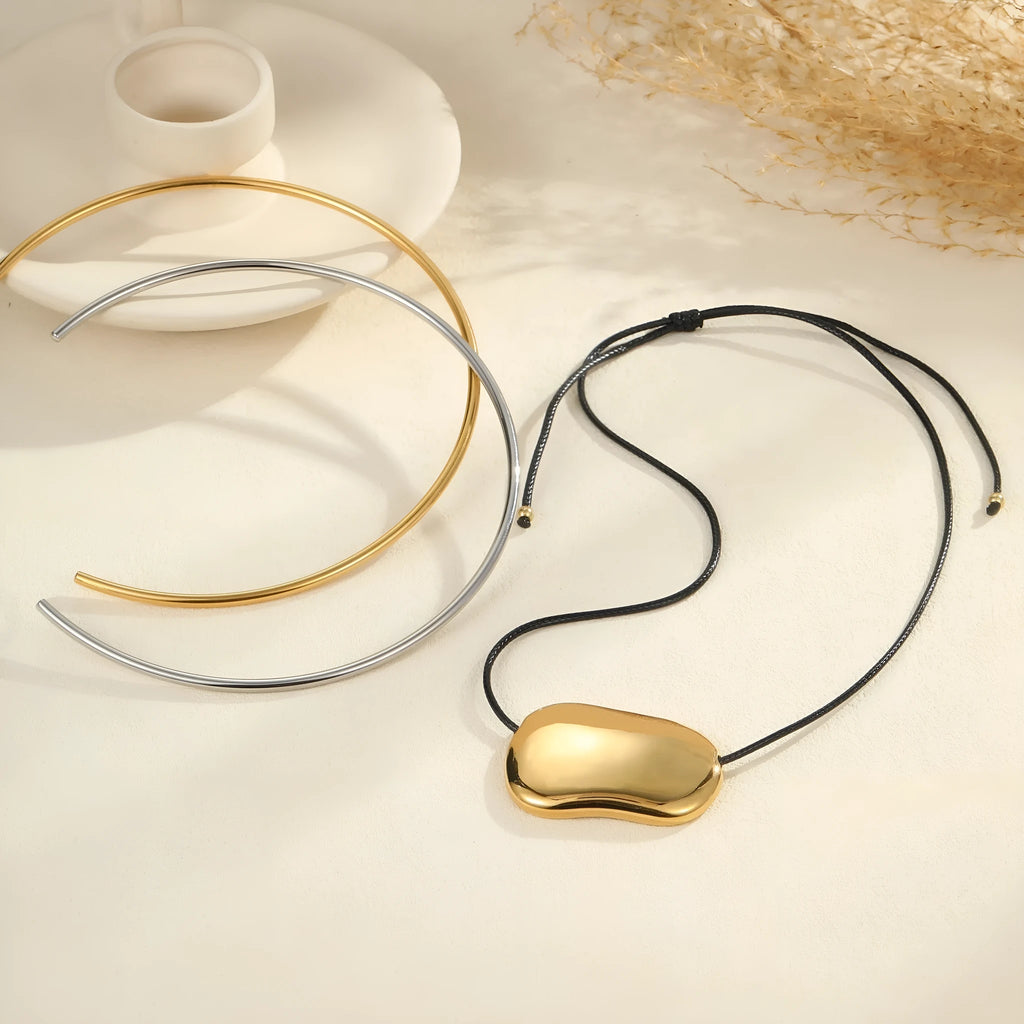 Stainless steel necklace with 18K gold electroplating showing collar and pendant necklace styles