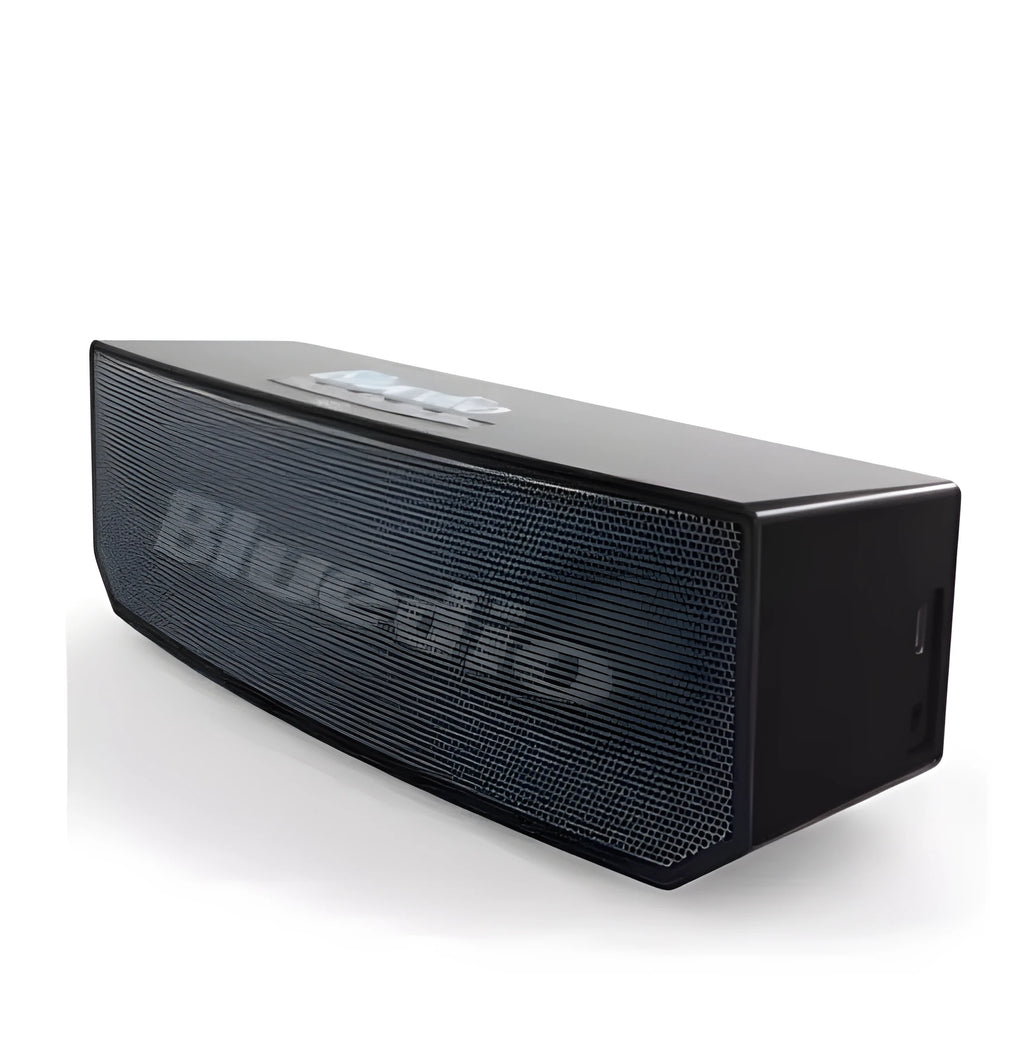 Black Bs-6 Bluetooth smart speaker on a desk showing its compact rectangular form.