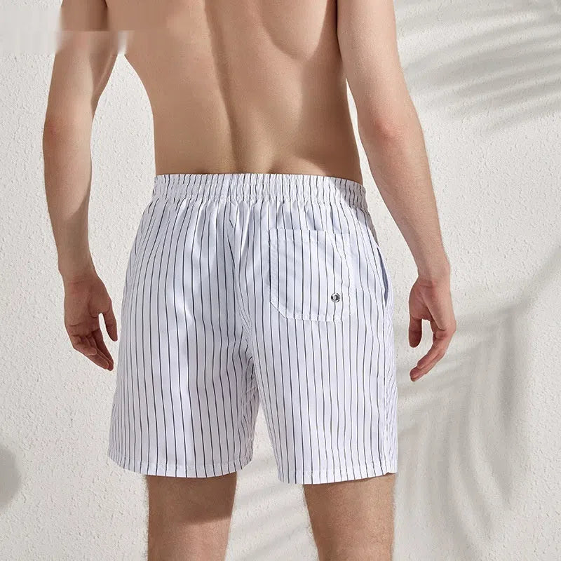 Men's white striped quick-drying loose plus-size beach pants with lining, waist elastic, and straight leg cut