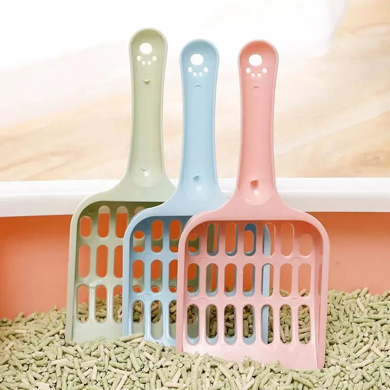 Plastic cat litter scoop in blue green or pink measuring 20cm long for cleaning pet toilet sand