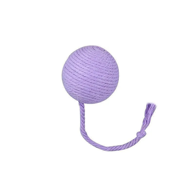 Cat toy ball with rope attached in green, pink, purple, or yellow colours with internal bell