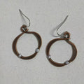 Pair of retro hollow round alloy earrings with bronze electroplated finish and geometric drop shape