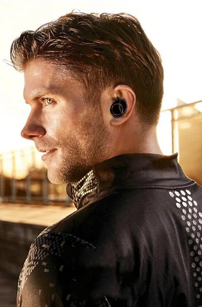 Black X11 Bluetooth wireless earbuds with a matching charging case and assorted silicone ear tips.