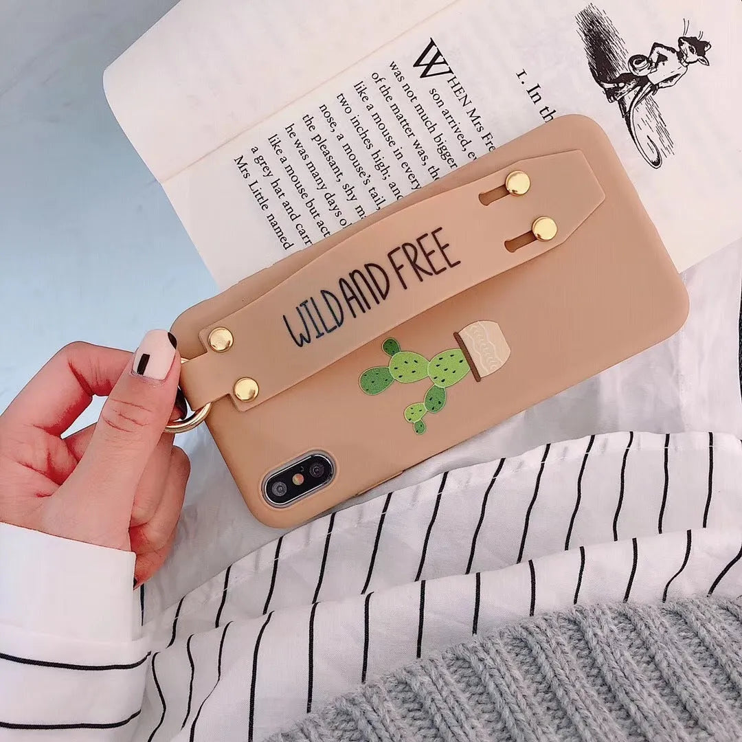 Green graffiti-style phone case with a wristband holder for an iPhone.