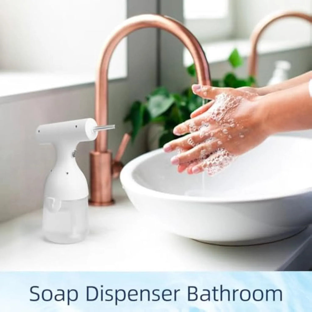 White electric foam soap dispenser with two nozzles and a USB charging cable for pet and home cleaning.