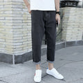 Men's loose straight-leg harem jeans in cotton, shown in blue colour on a neutral background.