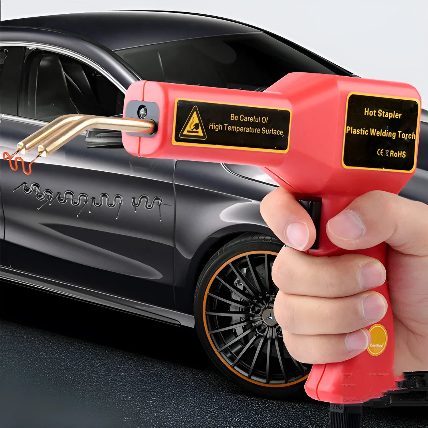 Red CR307 model 30W plastic welding gun for car bumper repair on a workbench.