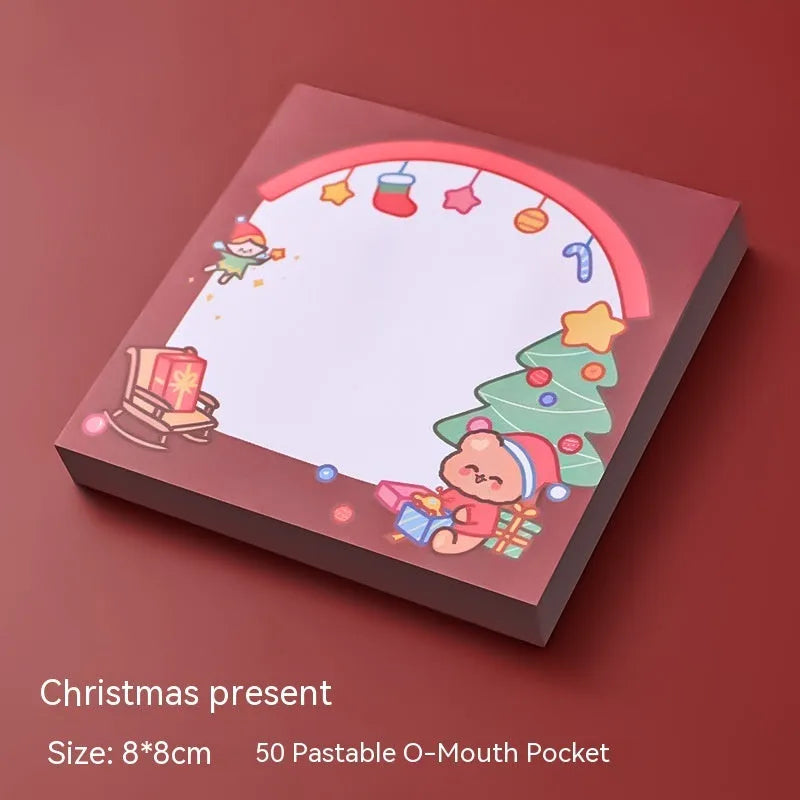 Christmas cartoon sticky notes pad showing eight festive designs including Santa Claus, snowman, and Christmas elf