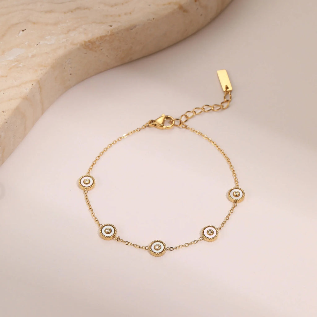 Women's stainless steel bracelet with 18K gold plating and geometric fritillary pattern design