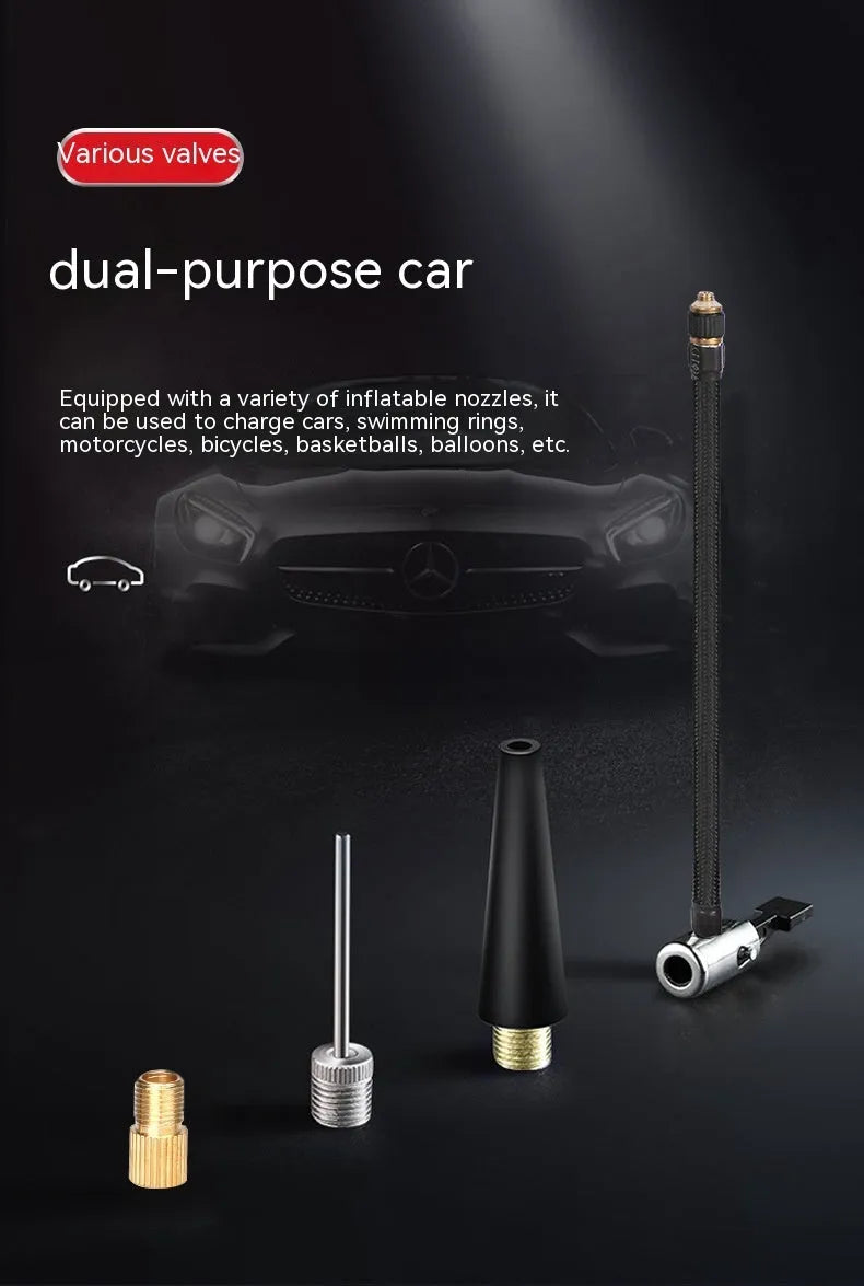 Red and black portable car tyre air pump with power cable and multiple nozzle attachments