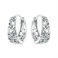 Sterling silver retro butterfly earrings with hollow design and zircon detailing