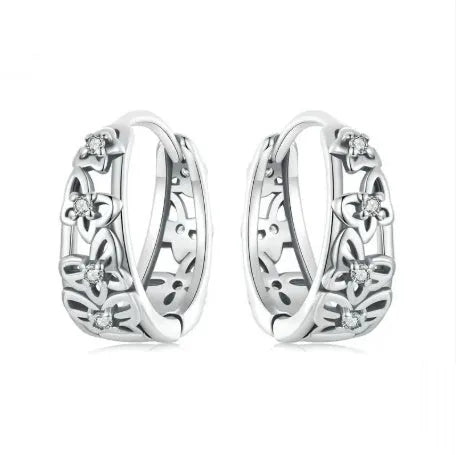 Sterling silver retro butterfly earrings with hollow design and zircon detailing
