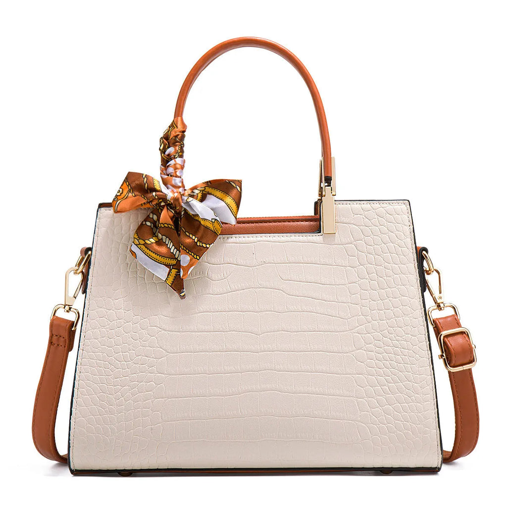 Milky white women's PU shoulder handbag with organised internal compartments on a plain background.