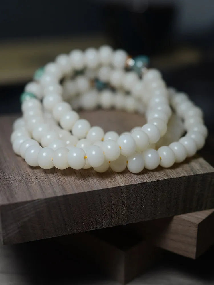 White jade bodhi root bracelet with 108 flat round beads in two sizes