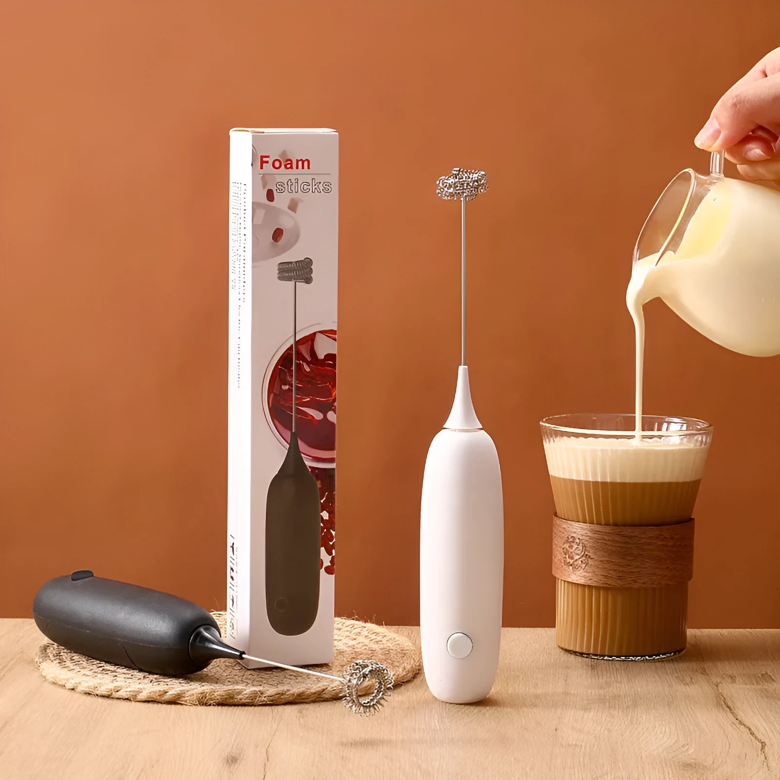 Black and white hand-held electric milk frother blender modern simplicity design