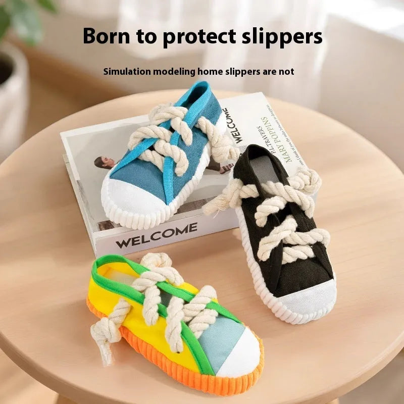 Squeaker dog chew toy shaped like slippers in plastic with bends for dental cleaning