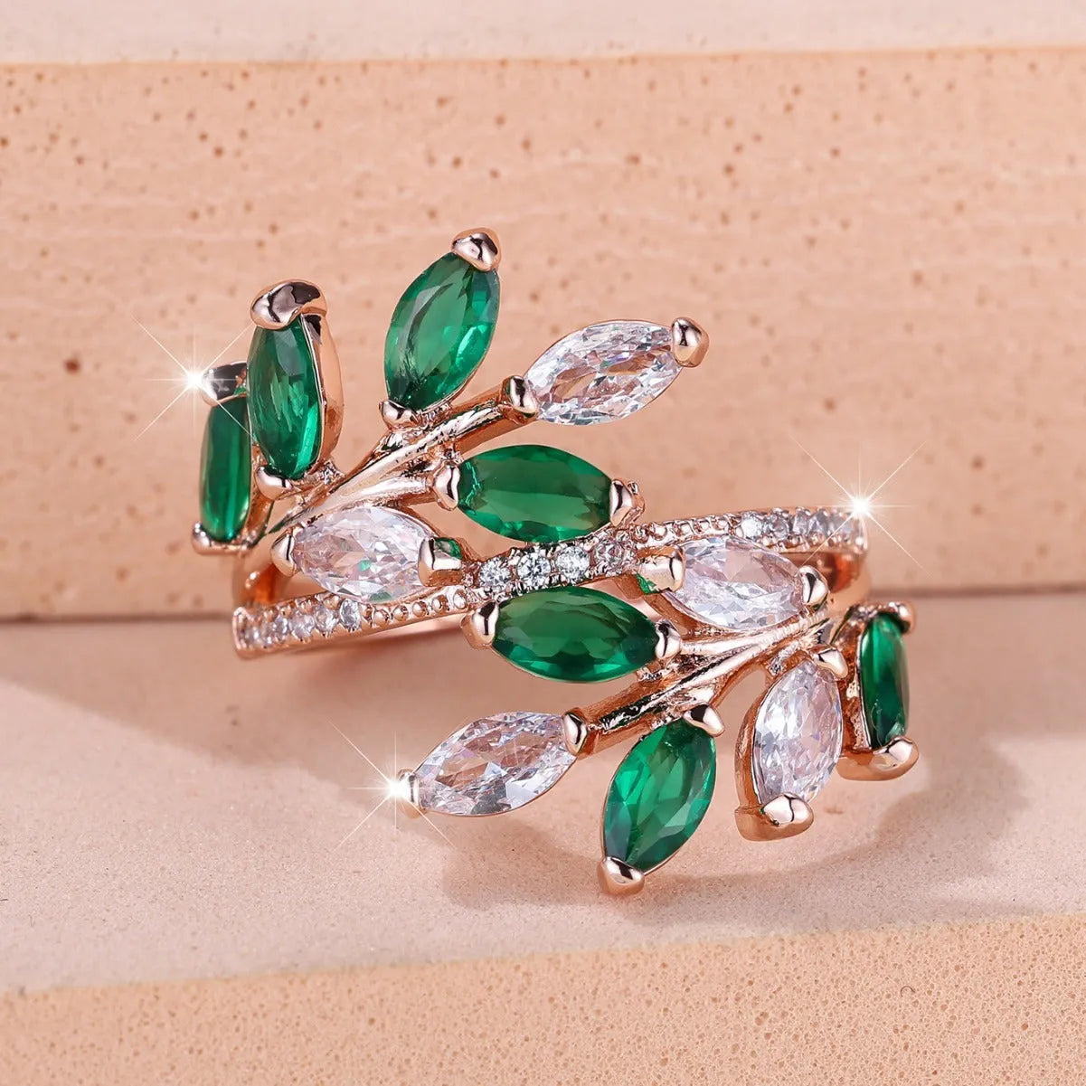 Adjustable leaf-shaped ring with horse eye cubic zirconia design in copper with rose gold plating