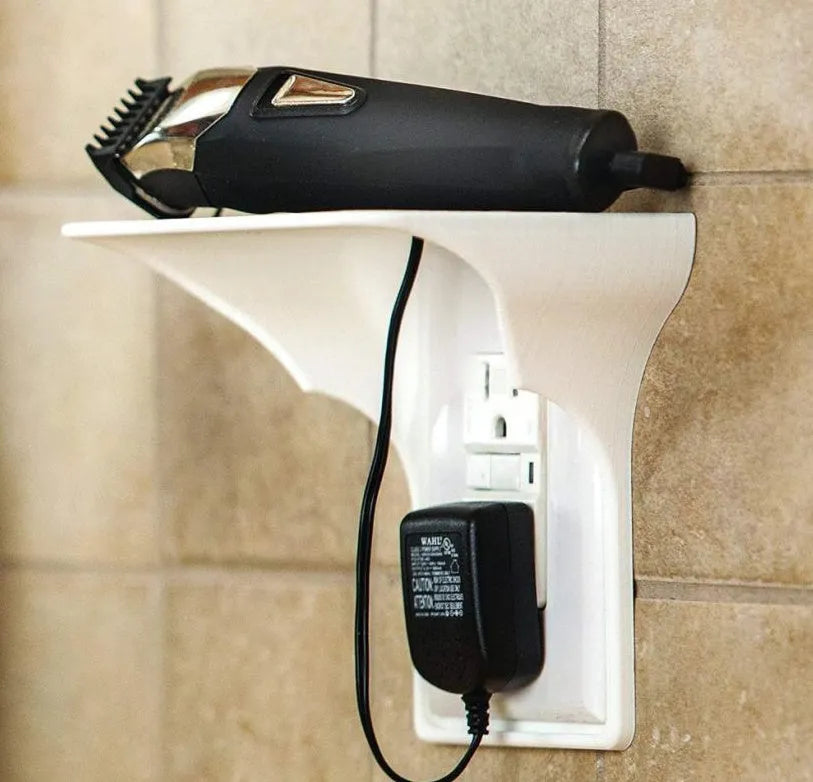 White PP plastic socket rack measuring 14x10x15cm designed to hold power strips and organise cables on a desk.