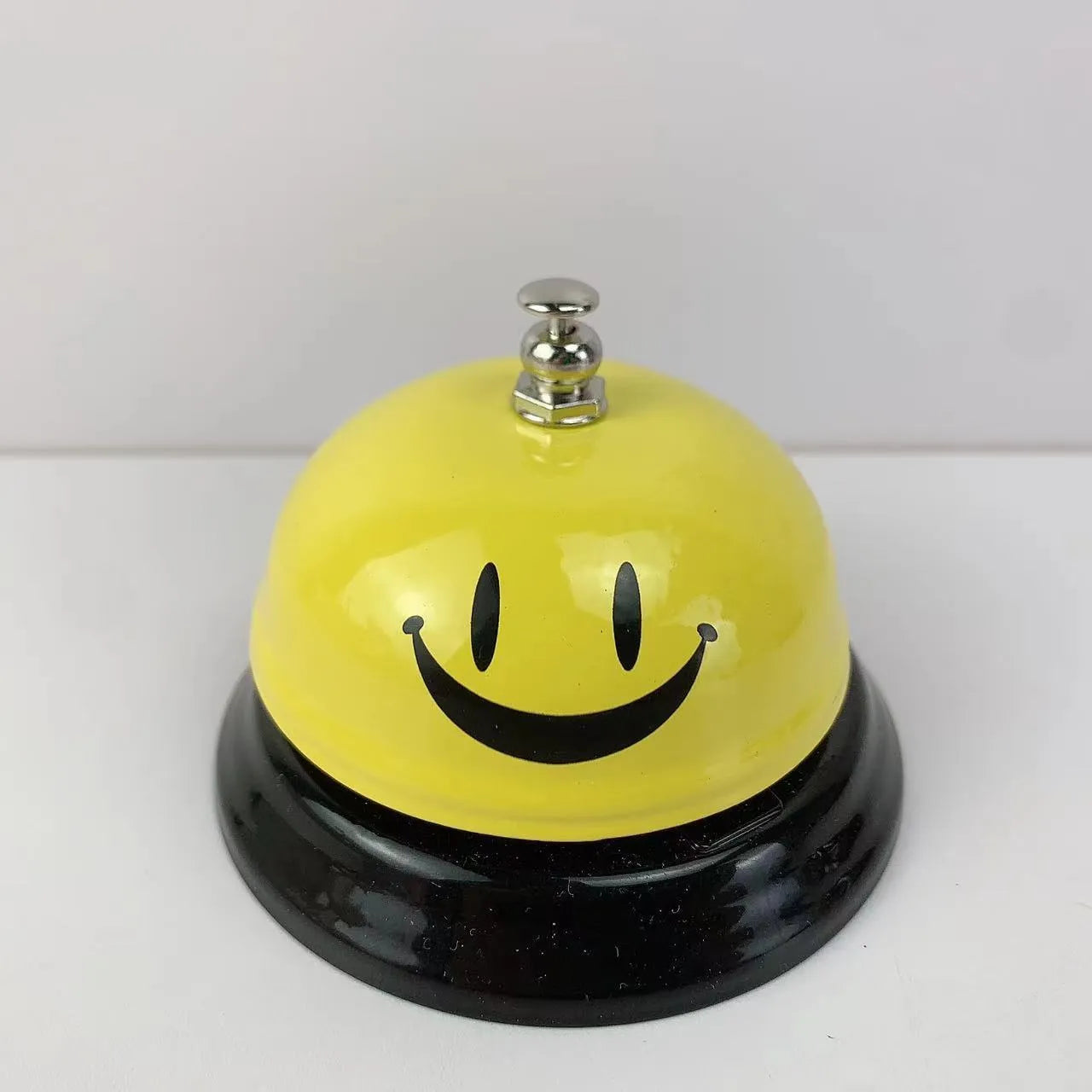 Iron game alarm bell available in twelve colours including Red Me, Rose Kiss, and Green Tea