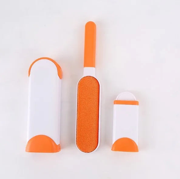Reusable pet hair removal comb with a self-cleaning base, shown in blue, for cleaning cat and dog fur from sofas.