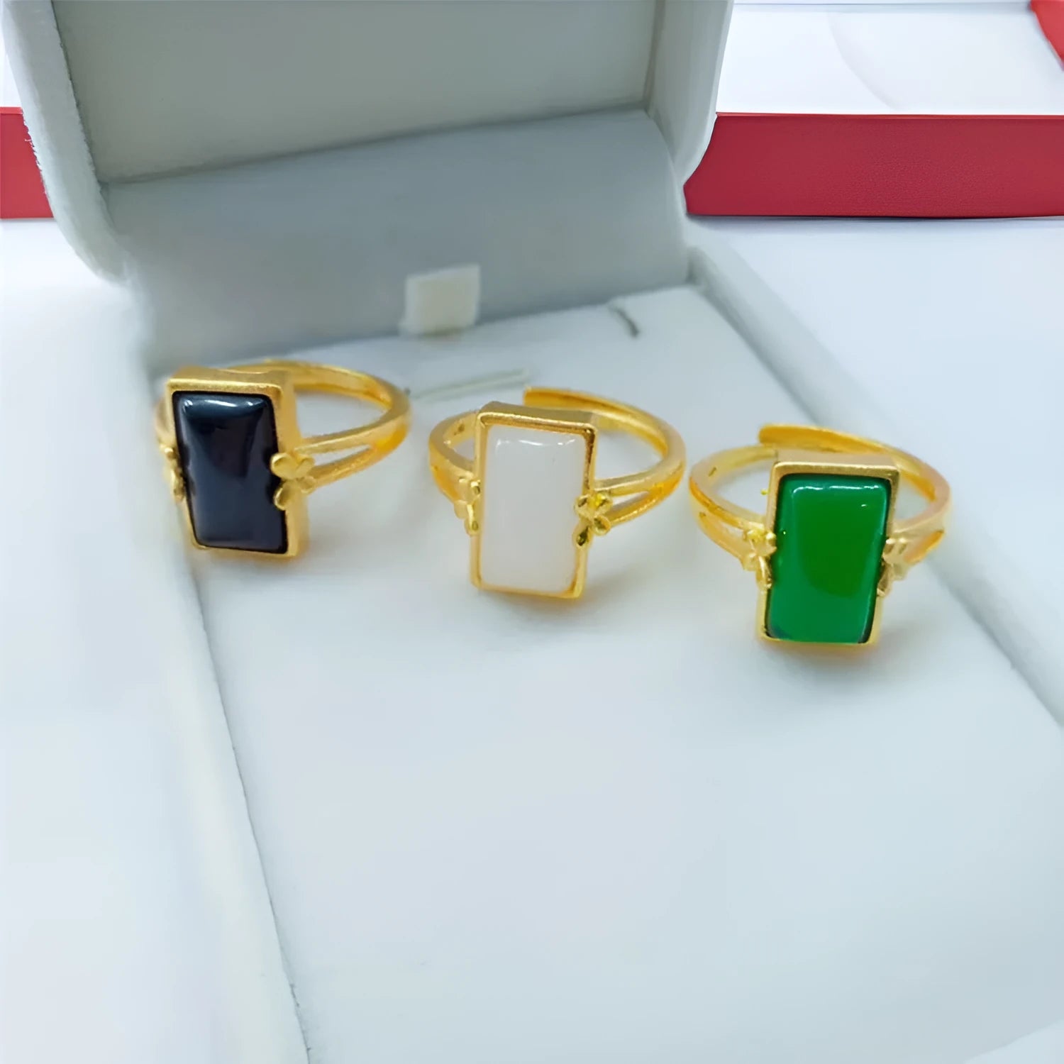 Adjustable brass gold-plated ring with electroplated finish and artificial gemstone accents