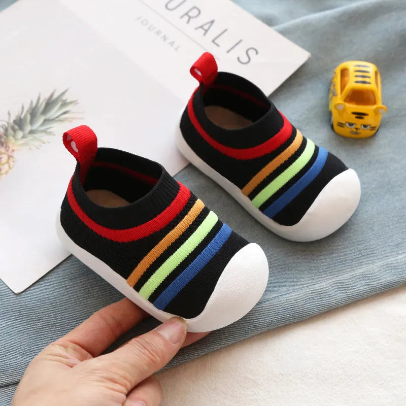 Children's flying knit sock shoes in blue with lace detailing and low-top design