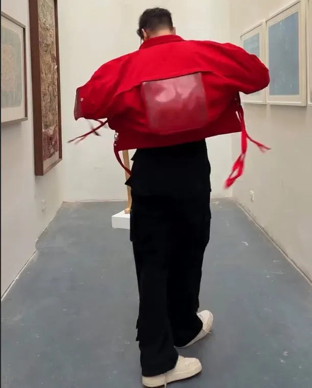 Men's red short jacket with full zip front, stand collar, and two side zip pockets