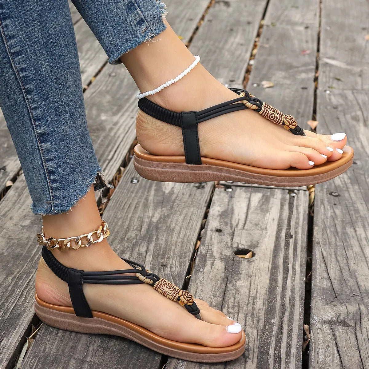 New women's flat sandals in beige with PU upper and hollow design