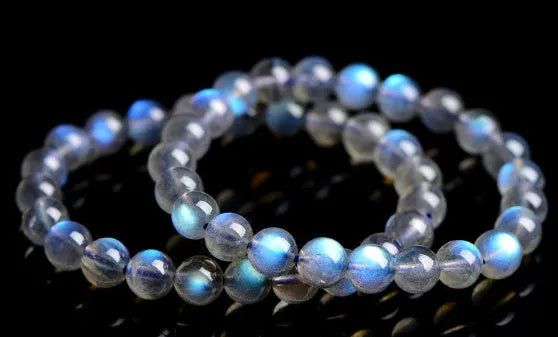 Natural cream body crystal bracelet with blue moonlight design showing minimalist unisex style